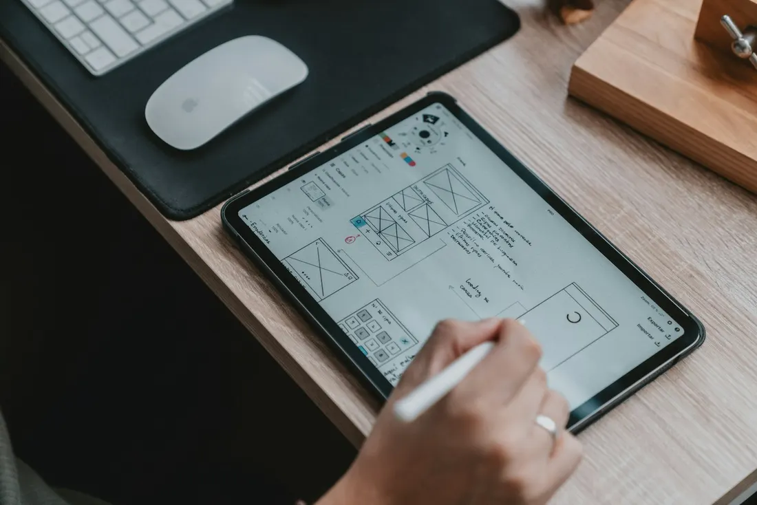 Sketching layout wireframes on a tablet with a stylus